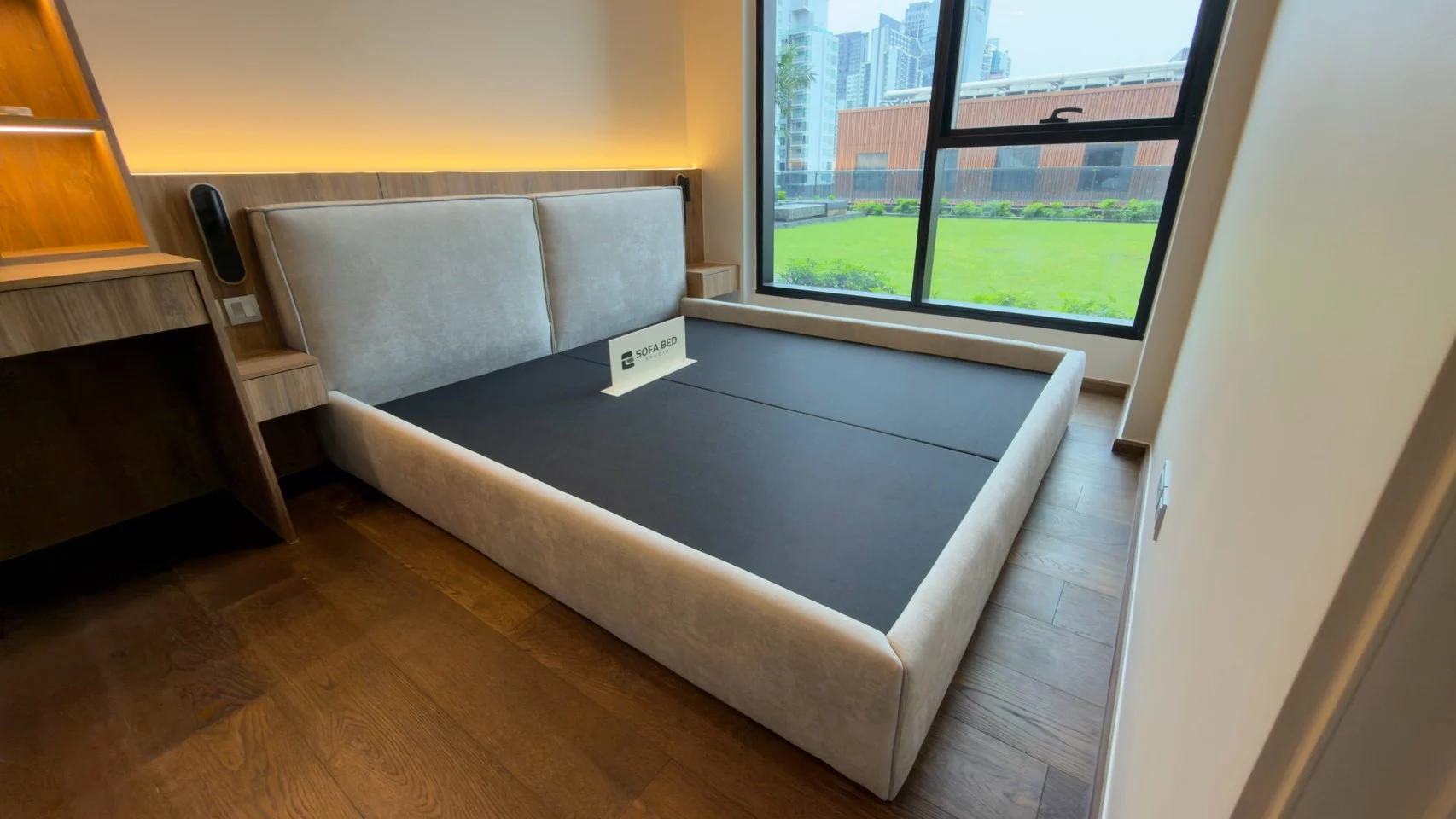 เตียงหัวสี่เหลี่ยมคู่สีเทาริมหน้าต่างห้องนอน · Sofa Bed Studio · DS-035